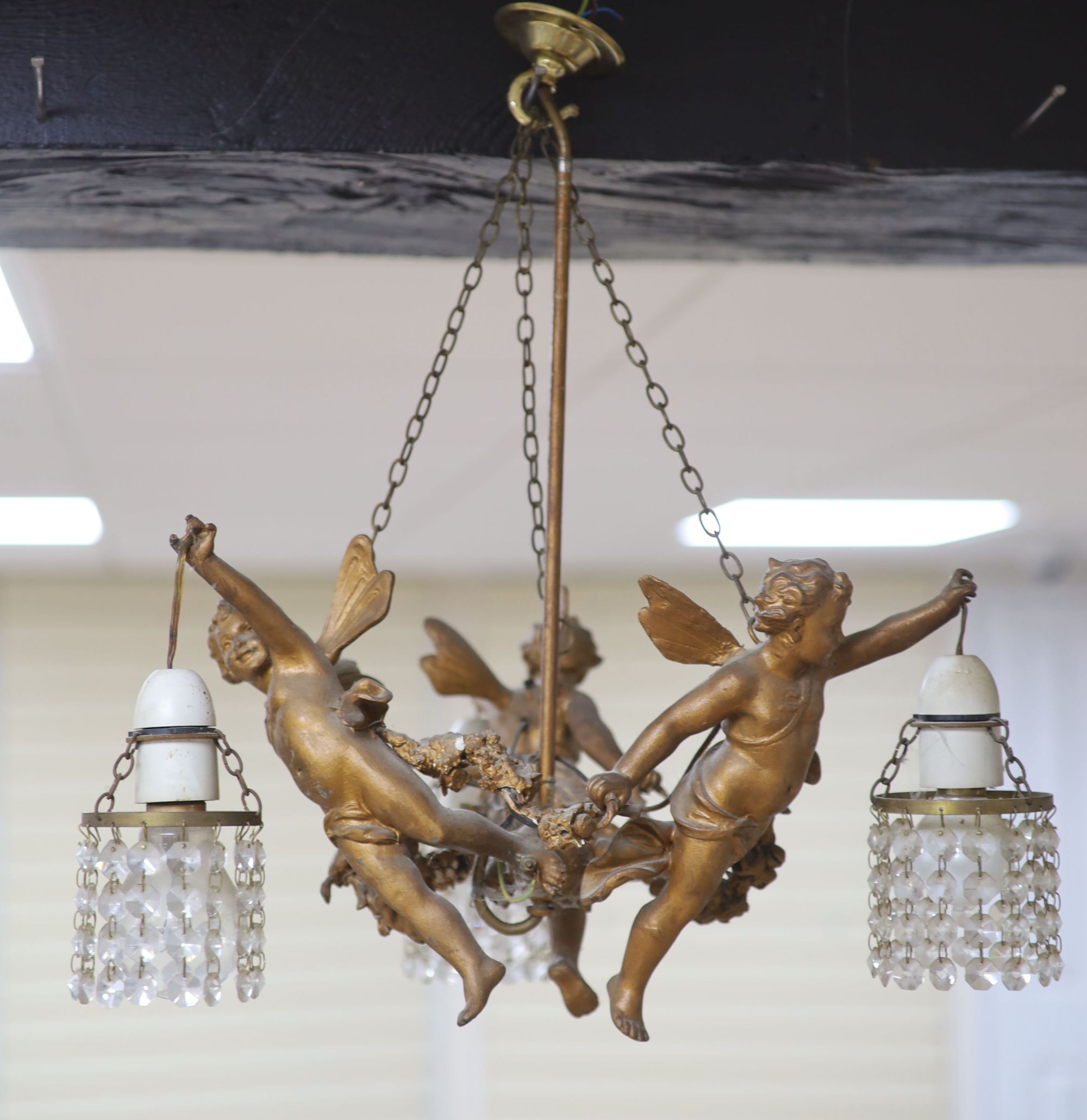 A metal framed ceiling lantern and a three branch cherub and lustre hung ceiling pendant (2)